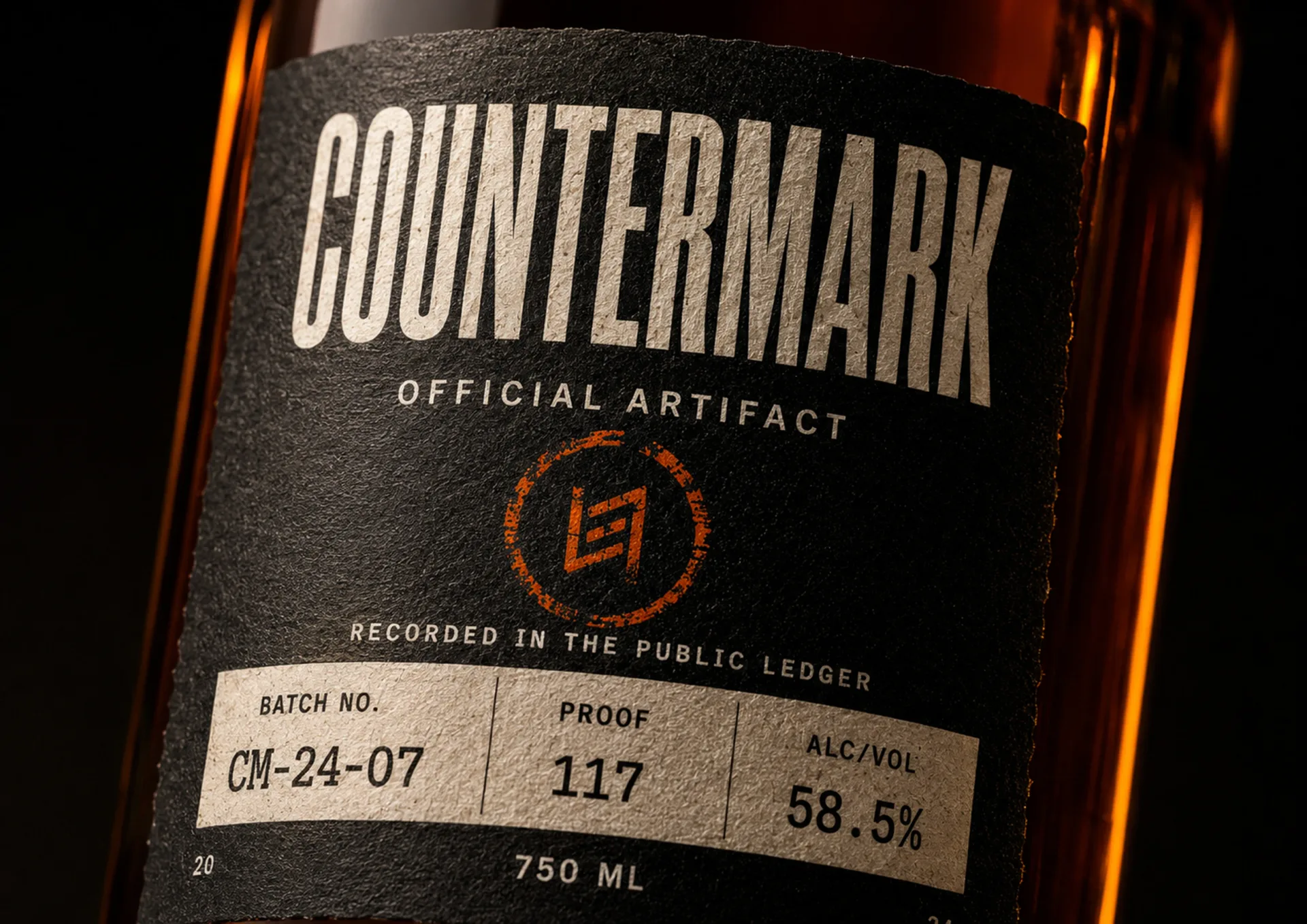 Countermark bottle label detail with batch number, proof, and public ledger language