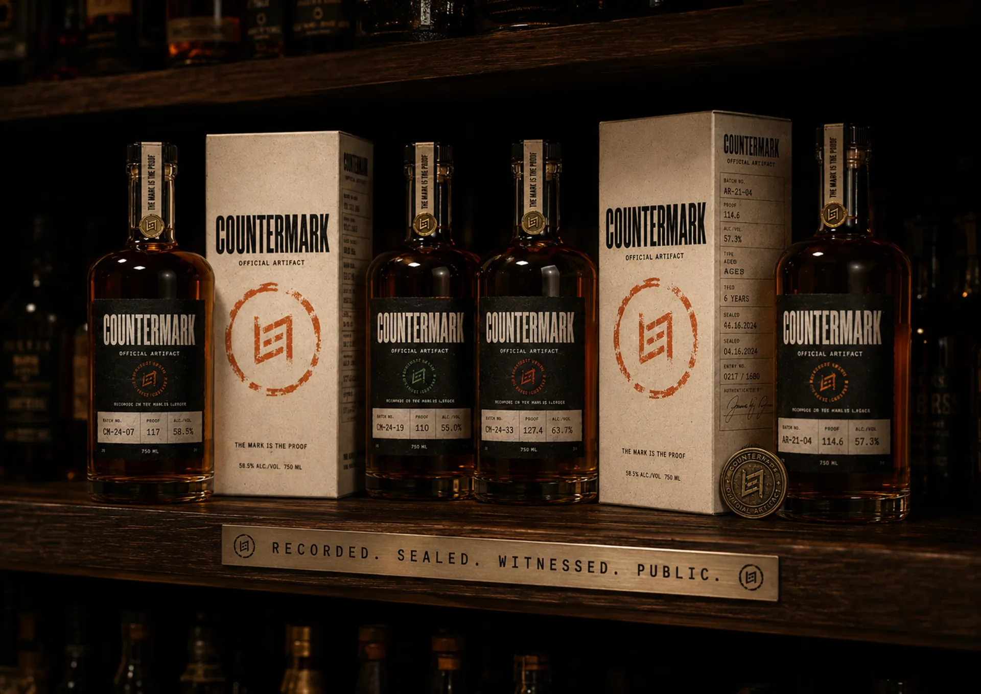 Countermark bottles and cartons arranged on a dark shelf